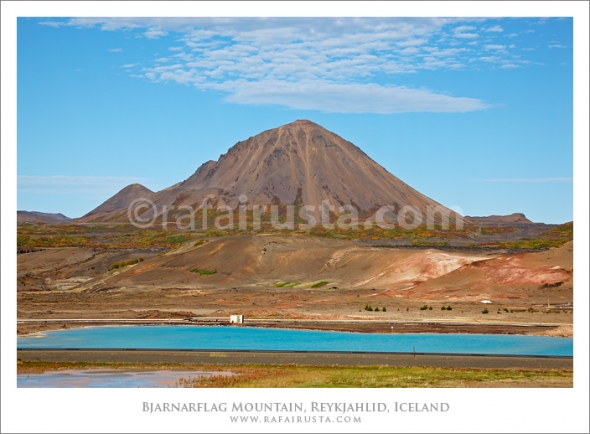 Beautiful clouds over the Bjarnarflag Mountain and diatomite plant, Reykjahlid, Iceland